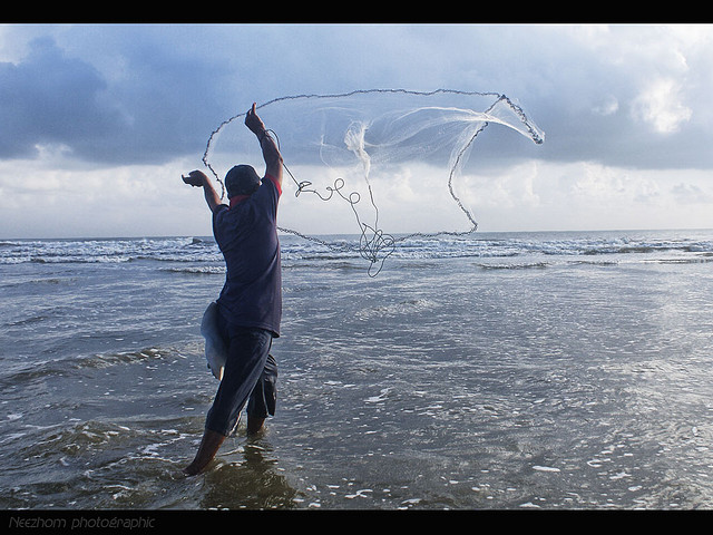 Image of a man casting a fishing net symbolizing search engine optimisation