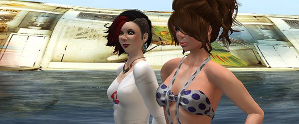 Vanessa Blaylock & Strawberry Singh looking at "Berry's Monday Meme Gallery" at LEA11 in Second Life