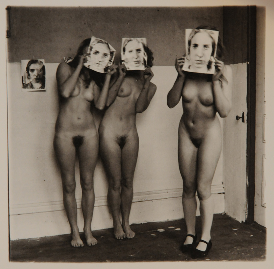 Terri Ray, Liz Tarnov & Vaneeesa Blaylock, HKAPA dance students standing naked in a room and holding photo prints of Terri Ray in front of their faces