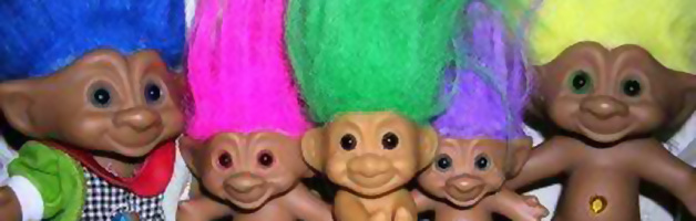 Image of "Troll Dolls" as a visual pun / analogy to online Trolls