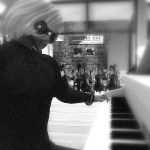 B&W photograph of pianist Pixel Reanimator performing at Gallery Xue / NYC