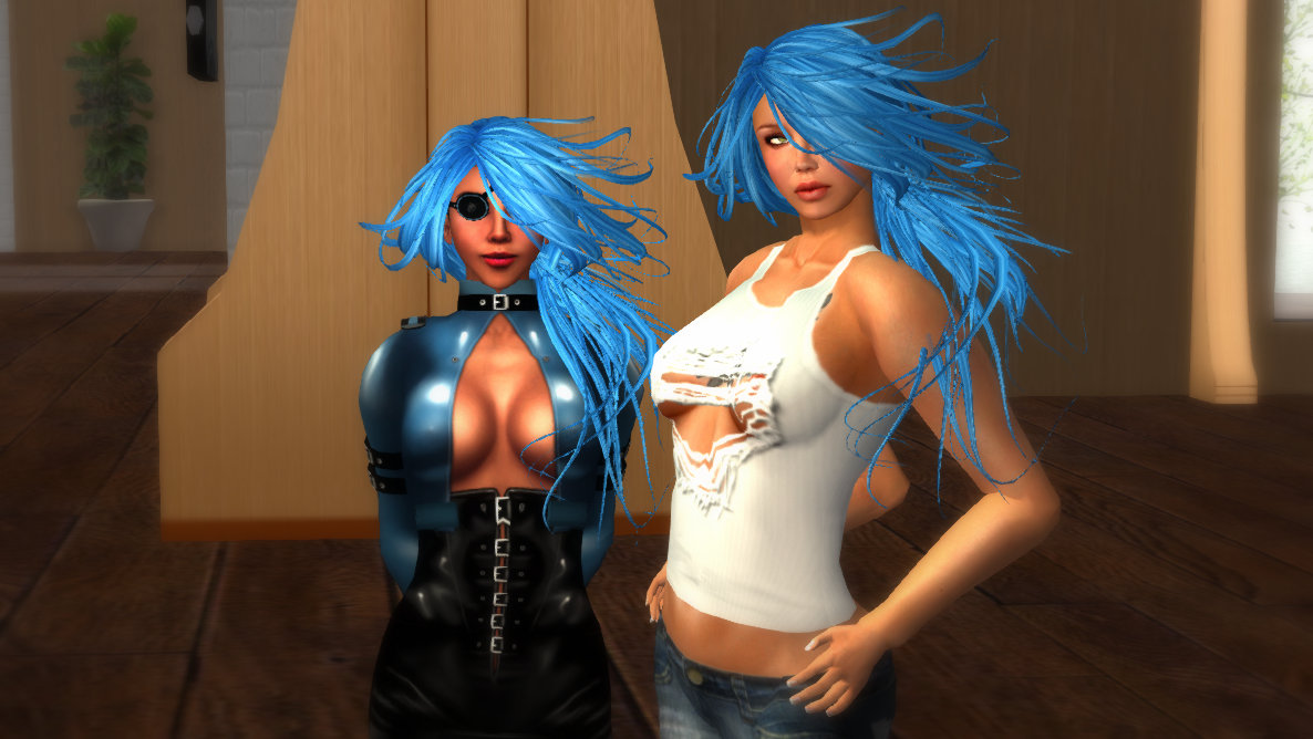 Color photo of Vaneeesa Blaylock and Fiona Blaylock at Exile Hair Salon after bleaching and dying their hair blue