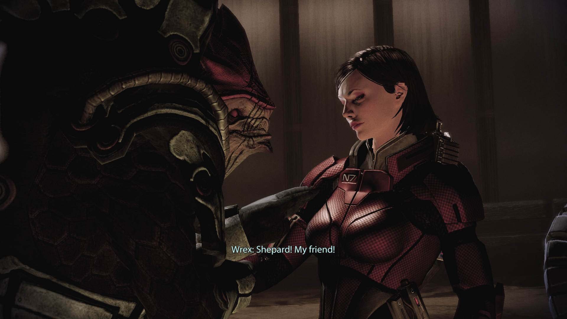 Two old friends meet: the krogan Wrex to the left pats the shoulder of protagonist Shepard to the right.