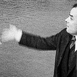 Image of Yves Klein throwing gold into the River Seine