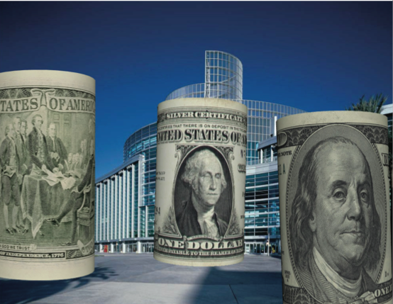 augmented reality image of rolls of American currency as tall towers in a city landscape