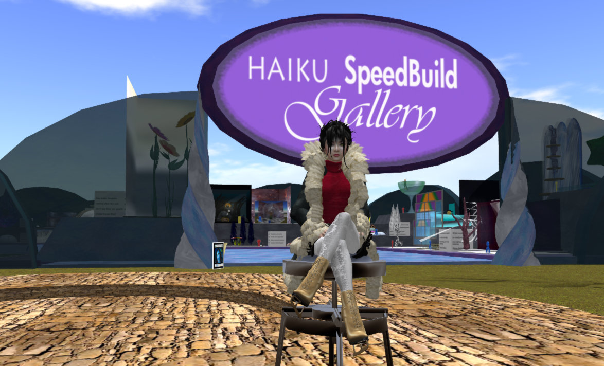 Photograph of Xue Faith sitting on a stool at the Haiku Speedbuild space in the Second Life region of Afar, with the "Haiku Speedbuild Gallery" sign, and the gallery itself, behind her.