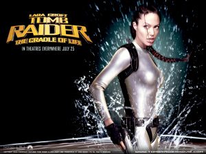 The clothed avatar. Virtual bodies in latex catsuits. Poster from Tomb Raider featuring Angelina Jolie as Lara Croft in a silver catsuit.