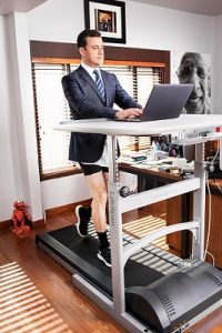 photo of Jimmy Kimmel walking on a treadmill desk